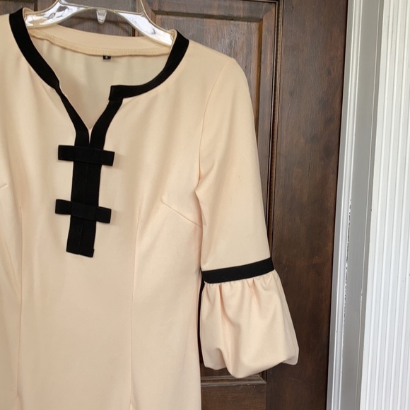 Butter with black trim balloon sleeve midi dress. - Picture 3 of 3